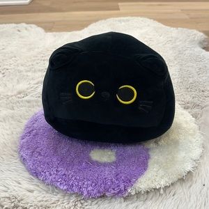 Small soft plush cat with tail